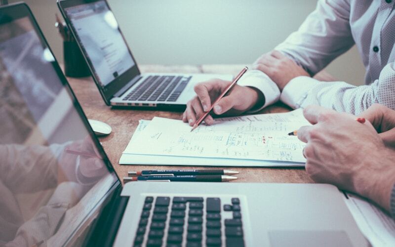 Team meeting in office — career income