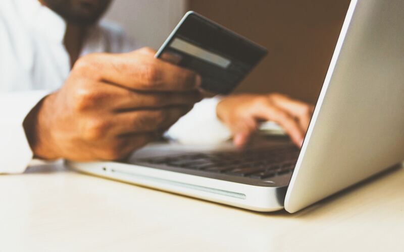 Smartphone on a desk — banking apps and automated money transfers