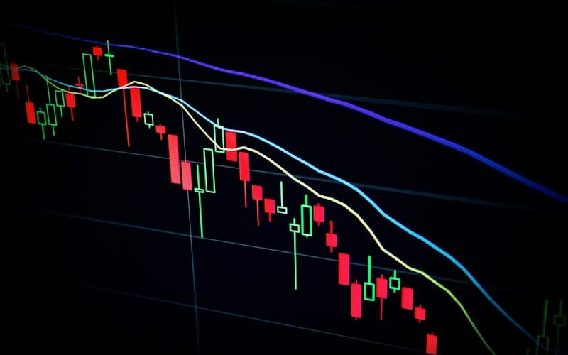 Laptop showing charts — investing