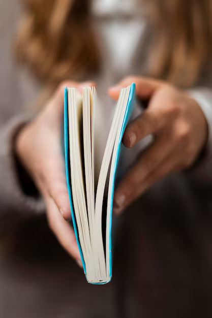 Reader reviewing finances on a tablet — practical money organisation